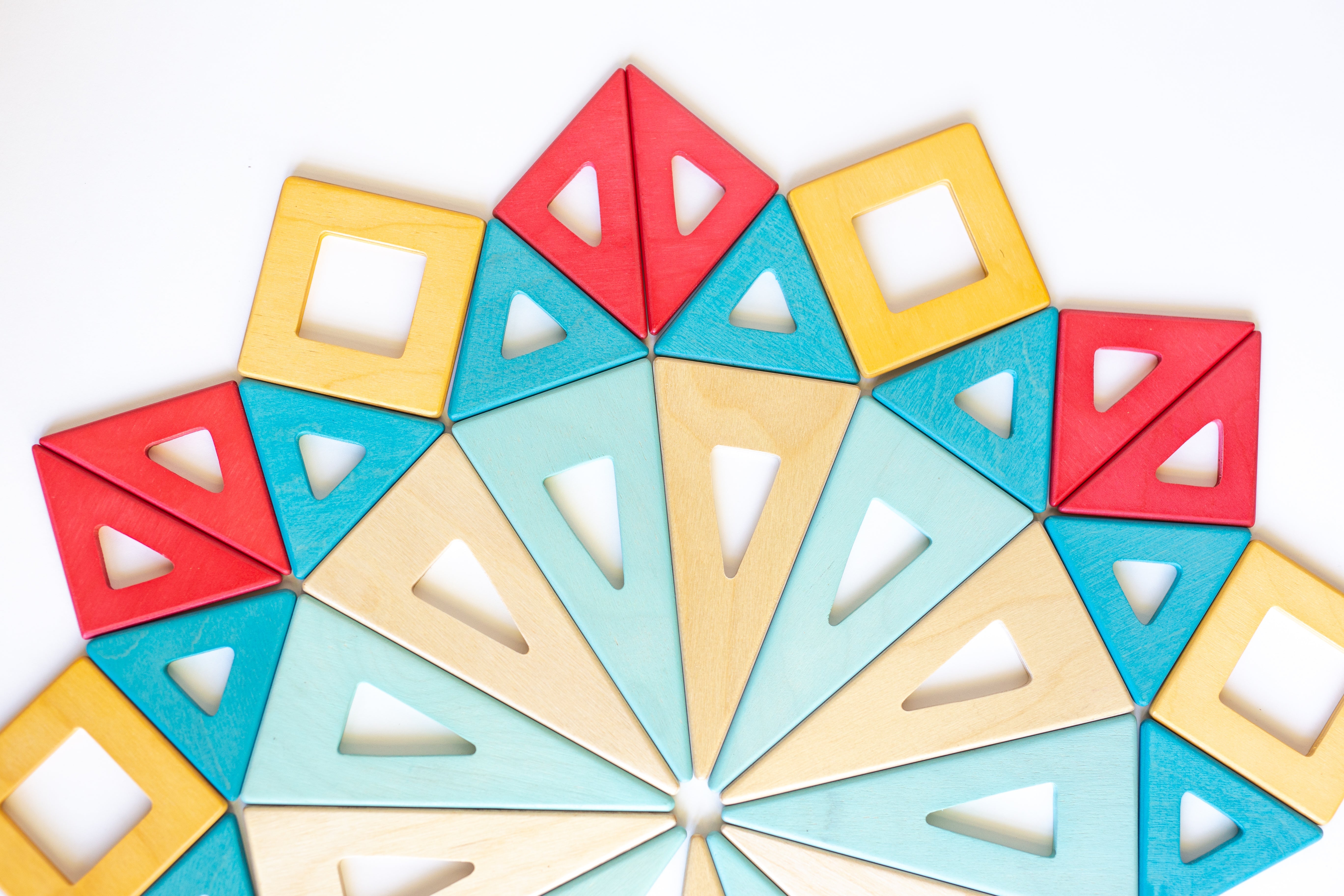 Colorful geometric tile pattern on a white background