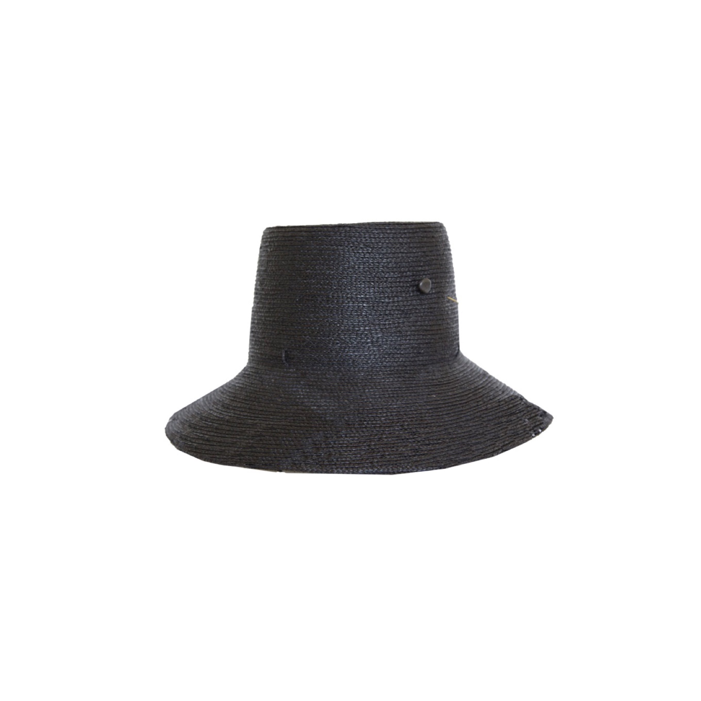 Black straw hat with two buttons on a white background