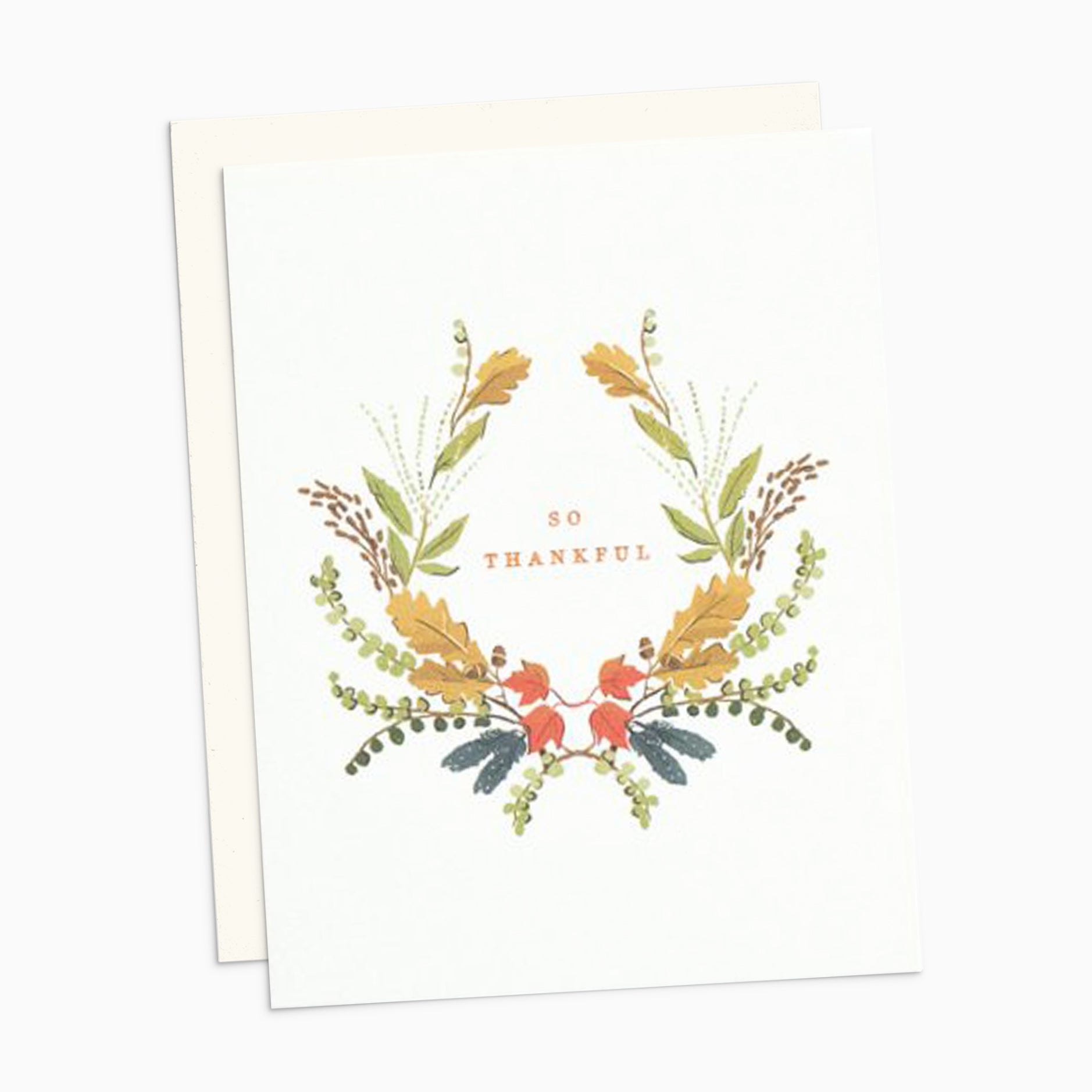 Illustrated Thanksgiving card with a wreath of fall-colored florals surrounding the gold foil words 'So Thankful' on warm white cardstock.