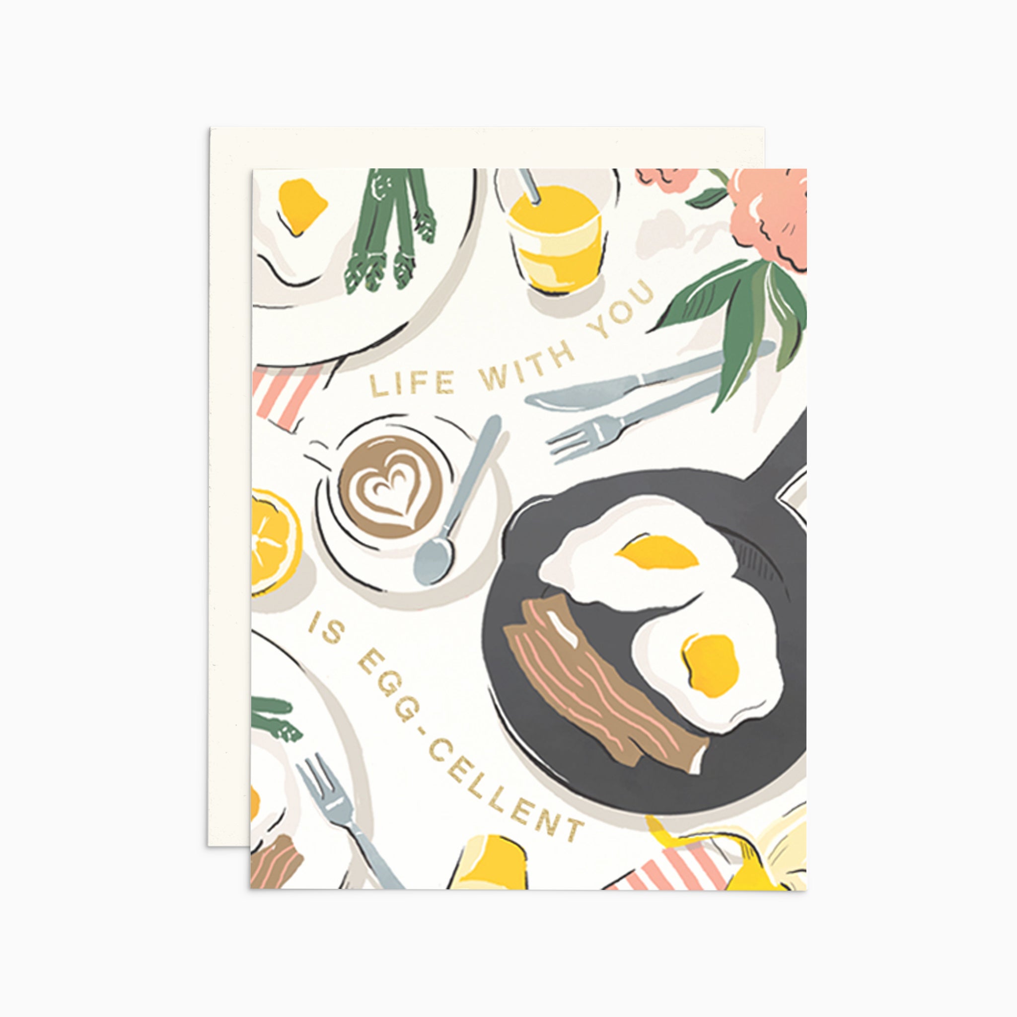 Illustrated 'Just Because' card on warm white premium cardstock, featuring a breakfast tablescape of eggs, bacon, and a latte with the text 'Life With You Is Egg-cellent.