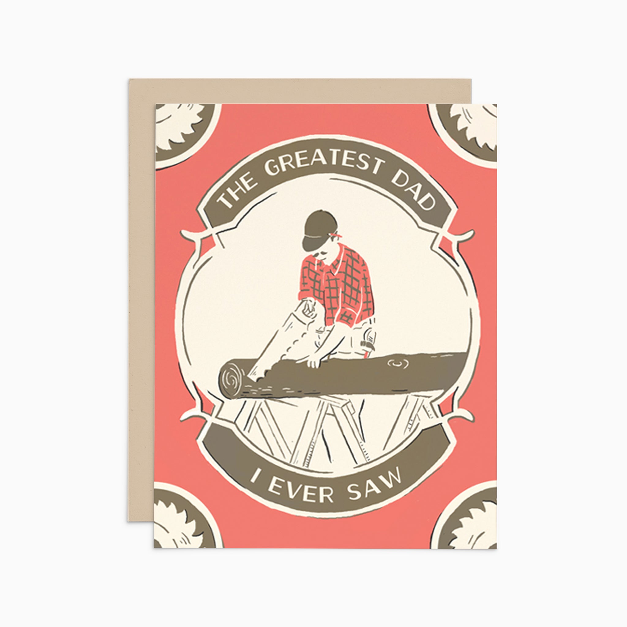 Illustrated Father's Day card on warm white cover cardstock, showing a person sawing a log and the punny text 'the greatest dad I ever saw,' perfect for celebrating Dad's special day. Positioned on a neutral background.