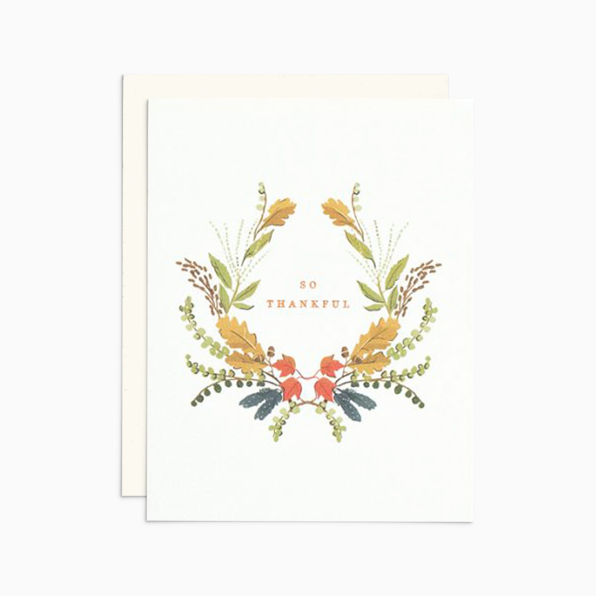 Illustrated Thanksgiving card with a wreath of fall-colored florals surrounding the gold foil words 'So Thankful' on warm white cardstock.