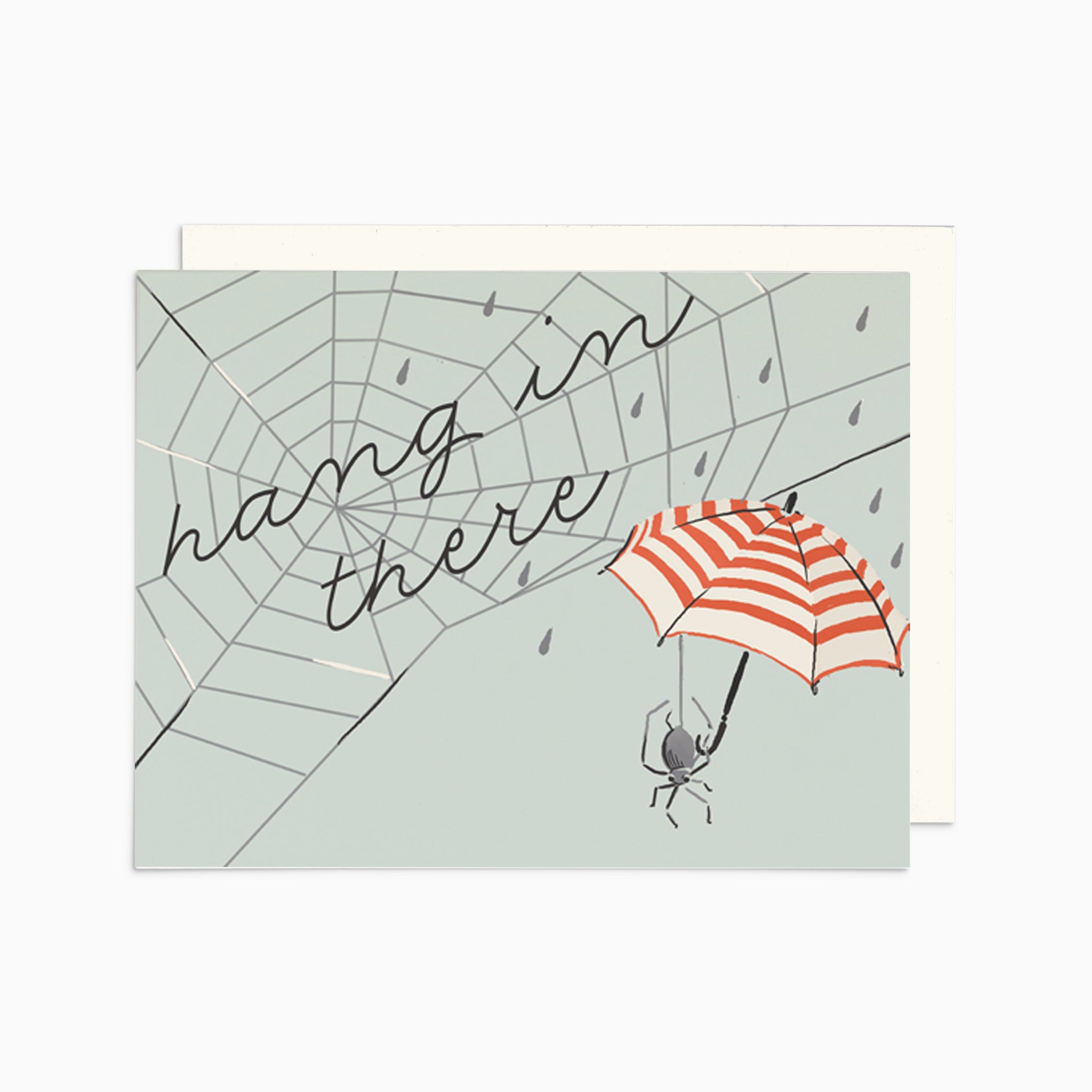 Illustrated sympathy card on premium warm white cardstock, featuring a spider web with the words 'Hang in There' and a spider holding a red and white striped umbrella on a pale blue background.