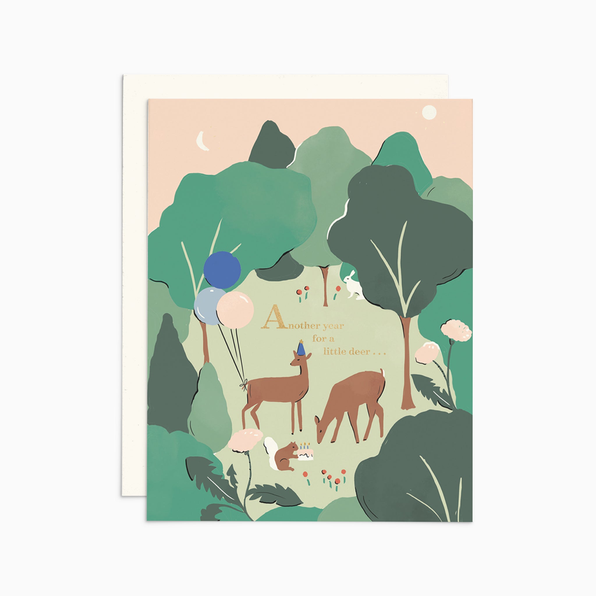 Illustrated birthday card with metallic gold foil text saying 'Another Year Older, My Little Deer,' featuring two deer in birthday hats and balloons on warm white cover cardstock.